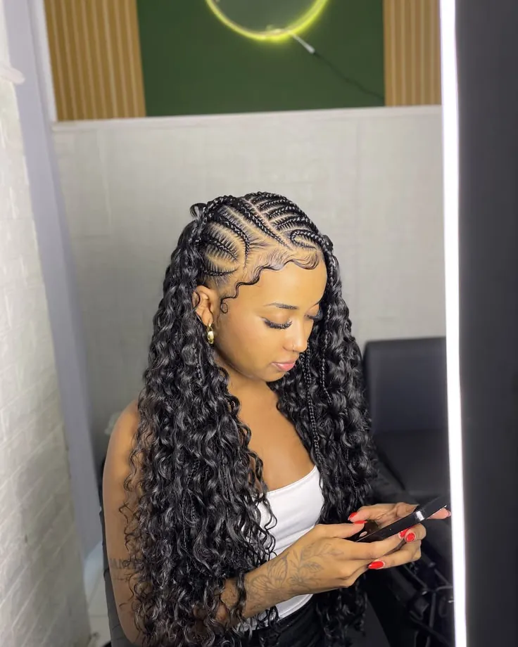 Woman with Fulani braids into long curls